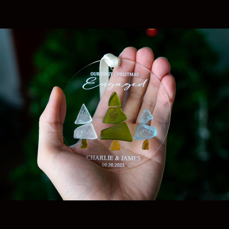 Engaged Christmas Ornament - Custom Name Greenery Engagement Keepsake, Personalized Our First Christmas Engaged Sea Glass Ornament by Dovaart.com