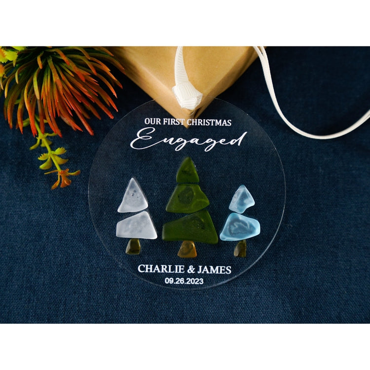 Engaged Christmas Ornament - Custom Name Greenery Engagement Keepsake, Personalized Our First Christmas Engaged Sea Glass Ornament by Dovaart.com