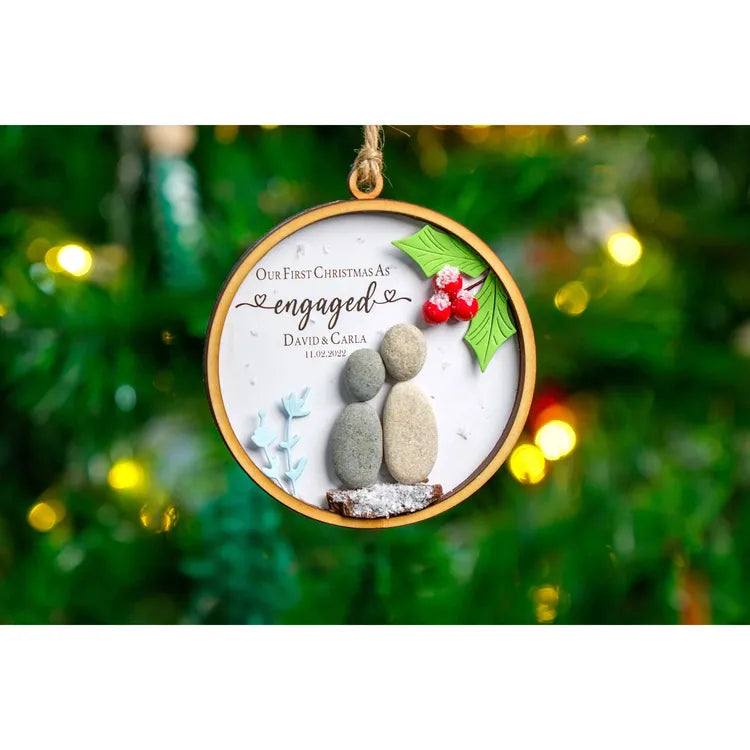 First Christmas engaged ornament for couple under cherry tree by Dovaart.com