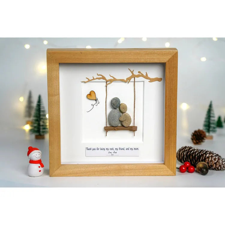 Mother's day gifts pebble art mom hug a child in a swing by Dovaart.com